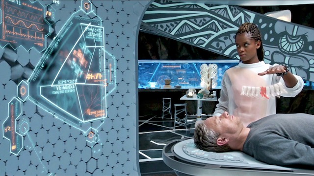 Shuri running health checks on Everett K. Ross in her lab in the movie, Black Panther.